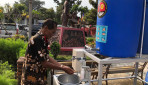 KKN-PPM UGM Gergunung, Klaten Buat Alat Cuci Tangan Sistim Penjernih Air 