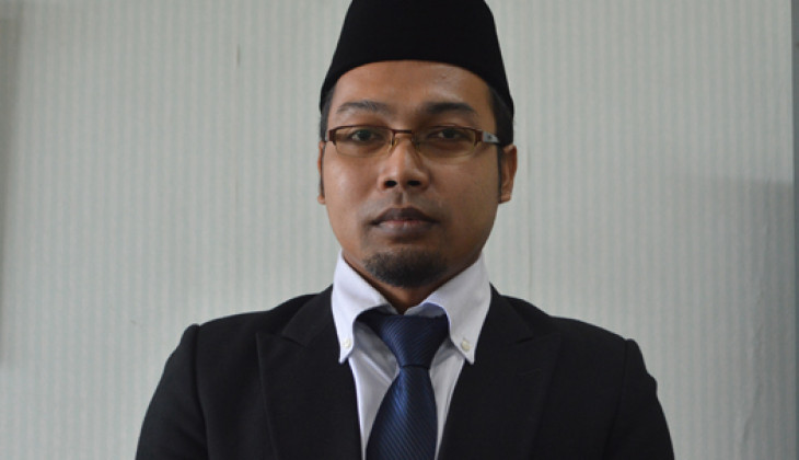 Nur Faizin berhasil meraih gelar doktor usai menjalani ujian terbuka program doktor di Sekolah Pascasarjana UGM, Jum'at (29/1).